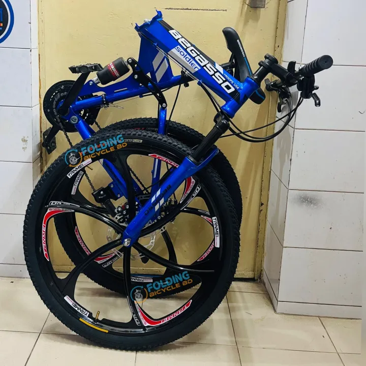 Begasso%20Folding%20Bicycle%20%7C%2026%20Inch%20%7C%20Alloy%20Wheel%20%7C%206%20Nives%20%7C%20Double%20Suspension%20%7C%20Shimano%20Gear%20&%20Brake%20%7C%20Double%20Disk%20Brake%20%7C%20Blue%20color.%20-%20Image%202