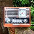 KTF-1647 Bluetooth, AUX, USB, TF Card & FM/AM/SW 8 Band Radio Supported Speaker With Clock & LED Flashlight.