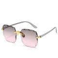 2023 New Rimless Women's Sunglasses Fashion Gradient Lenses Sun glasses Lady Vintage Alloy Legs Classic Designer Shades UV400.