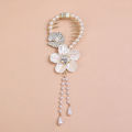 New Temperament Retro CamelliaTassel Fixed Plate Hair Artifact Pearl Ponytail Hair Clips Back Head Decorative Hair Accessories.