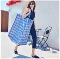 Moisture-proof quilt clothing storage bag thickened PP woven luggage packing bag folding portable travel storage bag.