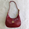 LuxeLure Glossy Crescent Bag – 2-in-1 Chic Carry by Miu Miu-Inspired Design.