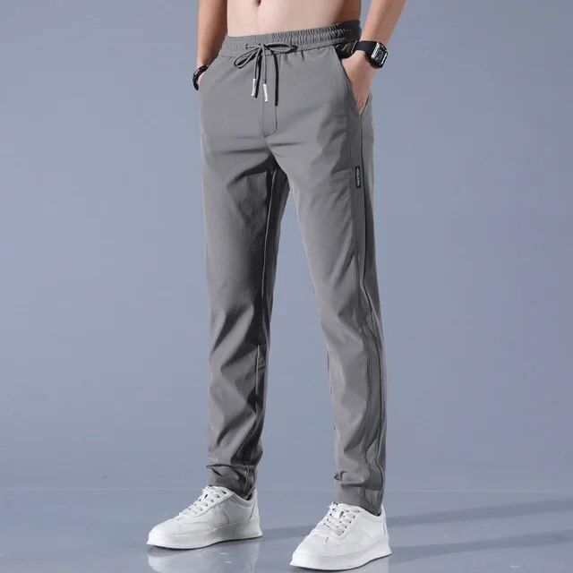 New%20Men's%20Ice%20Silk%20Trousers%20Solid%20Color%20Mid-Waist%20Loose%20Breathable%20Straight%20Casual%20Pants%20Thin%20Quick-Drying%20Drawstring%20Sweatpants%20-%20Image%205