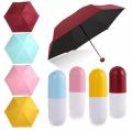 Foldable Mini Waterproof Ultra Portable Protective Mini Travel UV Capsule Umbrella with Long Size Handle for Men Women and Kids. 
