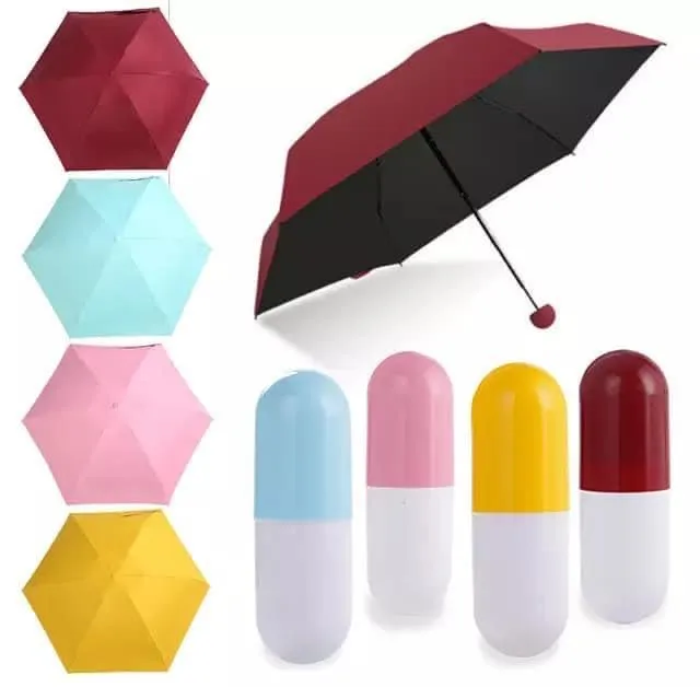Foldable%20Mini%20Waterproof%20Ultra%20Portable%20Protective%20Mini%20Travel%20UV%20Capsule%20Umbrella%20with%20Long%20Size%20Handle%20for%20Men%20Women%20and%20Kids%20-%20Image%205