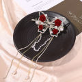 New Retro Fashion Red And White Flower Butterfly Tassel One Word Hair Clip Elegant Accessories For Women.