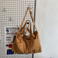 Japanese and Korean large-capacity washed canvas bag women's simple casual literary tote bag shoulder bag student class crossbody bag.