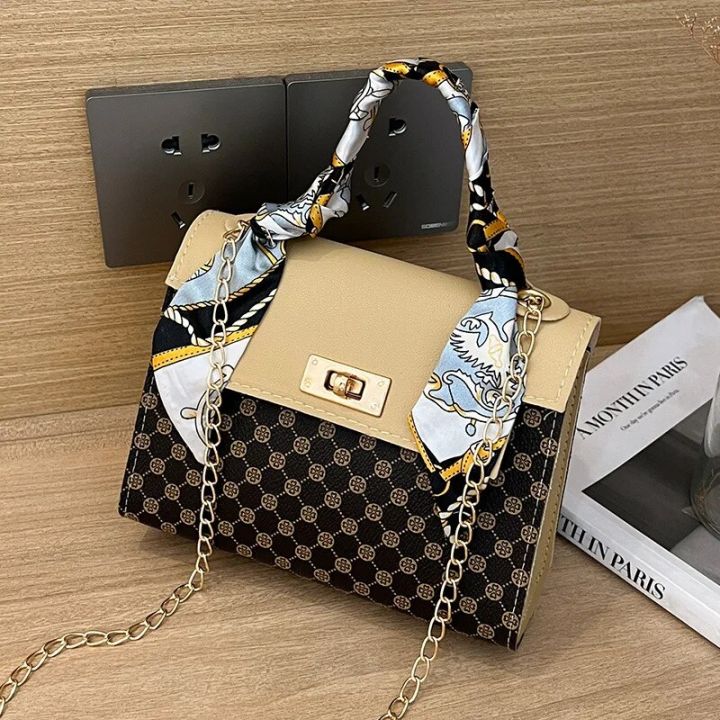 The%20Trendy%20Ladies%20Bags%20Are%20Fashionable%20and%20Casual,%20with%20Dot%20Print,%20Lock%20Buckle,%20Chain,%20Scarf,%20and%20Crossbody%20Small%20Square%20Bag%20-%20Image%205