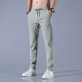 Men's Ice Silk Trousers Solid Color Mid Waist Loose Breathable Straight Casual Pants Thin Quick Dry Sports Pants.