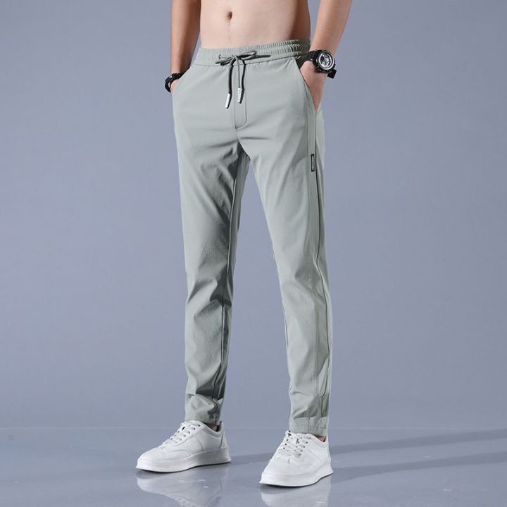 Men's%20Ice%20Silk%20Trousers%20Solid%20Color%20Mid%20Waist%20Loose%20Breathable%20Straight%20Casual%20Pants%20Thin%20Quick%20Dry%20Sports%20Pants%20-%20Image%205