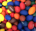 Rugby sponge ball to decompress and decompress hand-held pinch ball toy elastic American and British style -1pcs. 
