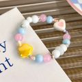 Sweet and Colorful Beaded Bracelet with Heart and Star Charms, Cute Gift for Girls Who Love Candy Colors Perfect Accessory.