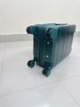 Elegant Forest Green Hard-Shell Spinner Suitcase - Lightweight ABS Carry-On Luggage with Ribbed Finish and Telescopic Handle. 