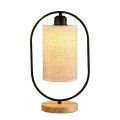 Nordic table lamp, bedroom bedside, simple personality, creative new Chinese retro fabric, warm solid wood dimming night light. 