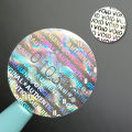 Silver Circular holographic sticker warranty void seals Adhesive labels with serial number High security laser stickers 1.5cm.