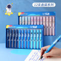 12 boxed elementary school pens with built-in ink absorber, anime cartoon design, children's dual-purpose iridium fountain pen.