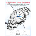 OLEVS 5567 Silver Stainless Steel Analog Watch For Men - White & Silver. 