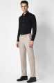 Peter England Elite Men Beige Check Slim Fit Formal Trousers. 