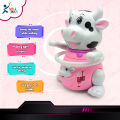 Battery operated Dancing Cute Cow Toy Swing hands & feet, Flashing light in horns  & Music. 