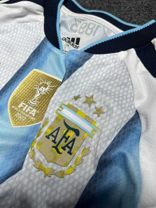 Argentina%20Baby%20Jersey%202026%20World%20Cup%20%E2%80%93%20Kids%20Football%20Jersey%20Set%20%E2%80%93%20Premium%203-Star%20National%20Team%20Kit%20Half%20Sleeve%20Argentina%20Home%20Kit%20premium%20sticker%20print%20-%20Image%202