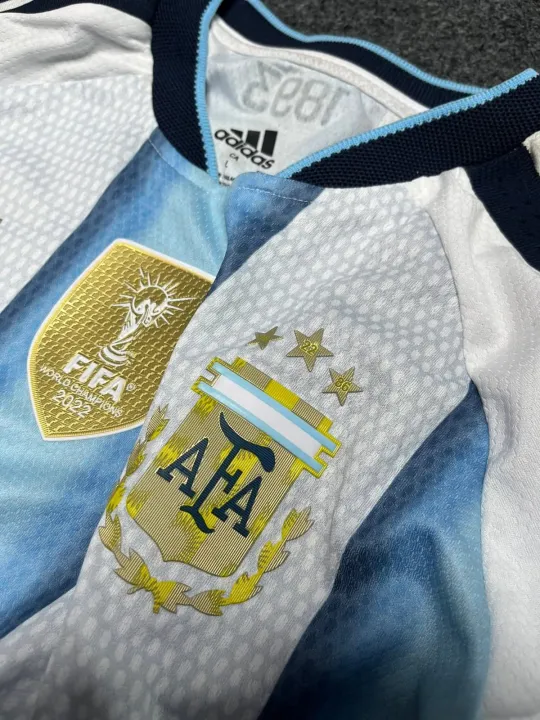 Argentina%20Baby%20Jersey%202026%20World%20Cup%20%E2%80%93%20Kids%20Football%20Jersey%20Set%20%E2%80%93%20Premium%203-Star%20National%20Team%20Kit%20Half%20Sleeve%20Argentina%20Home%20Kit%20premium%20sticker%20print%20-%20Image%202