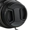 Black 58mm Plastic Snap on Lens Cap with Cable for SLR Cameras. 