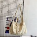 Japanese and Korean large-capacity washed canvas bag women's simple casual literary tote bag shoulder bag student class crossbody bag.
