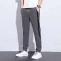 Summer Thin Ice Silk Pants Men's Summer New Korean Style Trendy Sports Casual Pants Straight Loose Long Pants. 