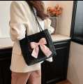 Bows Versatile Casual Hand-held Tote Bag Women's Bag Simple Spacious Trendy Crossbody Bag Commuter Bag.