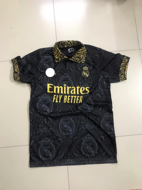 Real%20Madrid%20(With%20Embroidery)%20Premium%20Football%20Jersey%20Black%202023/24%20-%20Golden%20-%20Full%20Sleeve%20-%20Image%206