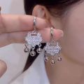 Sense of luxury, temperament, safety lock earrings, niche personality, bell earrings, fashion ear accessories wholesale.