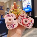 Cartoon Sanrio camera keychain children's toys luminous projection camera car keychain small gifts. 