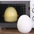 Kitchen Cooking Tool 4 Grids Egg Shape Microwave Egg Steamer White Egg Boiler Quick Microwave Boiled Egg Maker Breakfast. 