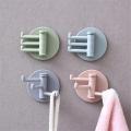 Multifunctional bathroom wall shelf free punching seamless trace rack rotating hook strong 3 branch rotating sticky hook.