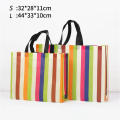 stripe Foldable handbag Stylish non-woven fabric Reusable shopper bag Eco-friendly tote bag for Travel Grocery shopping Outdoor activities Daily use Eco-conscious consumers. 