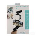 Exclusive AY-49 Phone Vlog Tripod Kit with Remote Control, Microphone, and LED Light. 