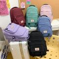 New middle and high school college students class school bag, large capacity, simple casual and versatile, solid color travel backpack for men and women.