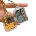 Useful Handy Crank Portable Musical Instrument Music Box Keychain Mechanical Movement.