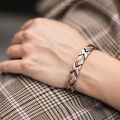 Longheng Europe and America cross-border jewelry diamond magnet red copper bracelet Amazon hot selling men's bracelet manufacturers wholesale. 