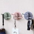 Multifunctional bathroom wall shelf free punching seamless trace rack rotating hook strong 3 branch rotating sticky hook.
