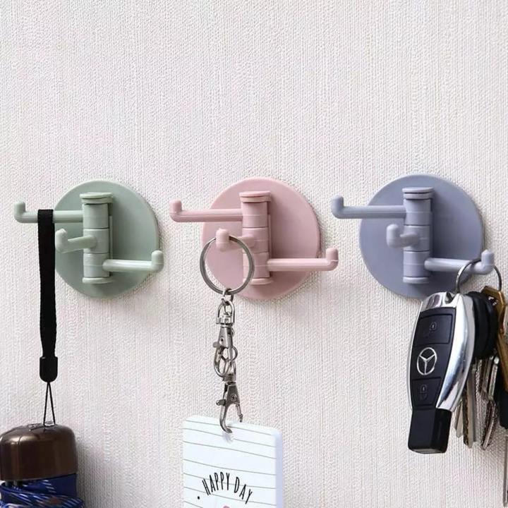 Multifunctional bathroom wall shelf free punching seamless trace rack rotating hook strong 3 branch rotating sticky hook