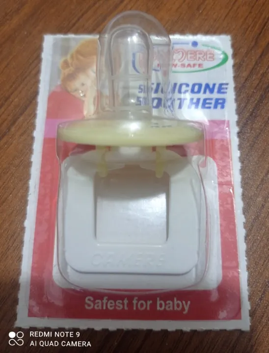 Newborn%20Baby%20Pacifier%20Nipple%20Soother%20Silicone%20Putting%20Baby%20Silicon%20Soother%20Baby%20Nipple%20-%20Image%202
