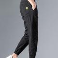 Stylish Casual Pants Mid-waisted Men Clothing Polyester Korean Style Men Ankle Tied Joggers Pants.