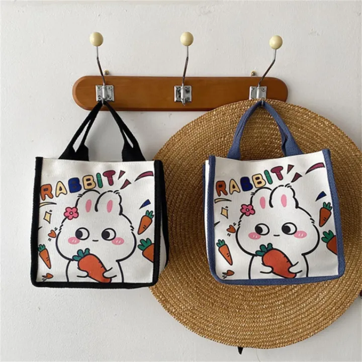 Lightweight%20Bunny%20Canvas%20Bag%20Eco-friendly%20Durable%20handles%20Canvas%20Cartoon%20Tote%20Bag%20Printed%20Design%20Cute%20Lunch%20Bag%20for%20Casual%20Outings%20School%20Accessory%20Female%20Students%20Lunch%20Storage%20Gift%20option%20-%20Image%207