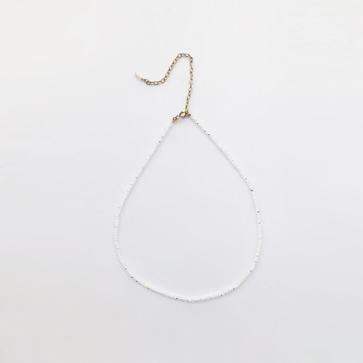 Each%20piece%20has%2032%20facets%20of%20the%20handmade%20piece,%20each%20with%20a%20sunshine%2014K%20gold-injected%20crystal%20choker%20collar%20with%20an%20extremely%20thin%20necklace%20-%20Image%205