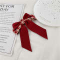 Simple polka dot checkered bow spring clip sweet versatile New Year red accessory Japanese and Korean hair clip at back of the head.