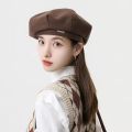 Black beret new women's autumn and winter Japanese face show small woolen octagonal hat ins painter hat big head hat.