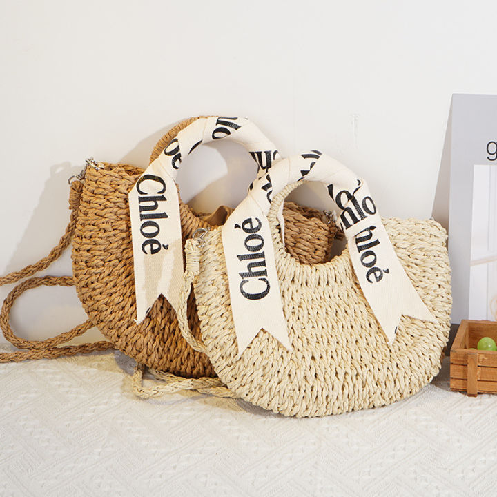 Alphabet silk scarf handpiece straw bag versatile semicircle weave women's bag women's seaside row vacation photo cross-body beach bag