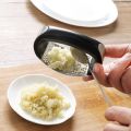 Stainless Garlic Press Household Press Squeezer Manual Gralic Press Device Handheld Ginger Garlic Tools Kitchen Accessories.