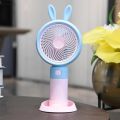 Rechargeable Stylish Cartoon Shape Mini Turbo Fan With Mobile Holder For Indoor & Outdoor Use -  Multicolor. 